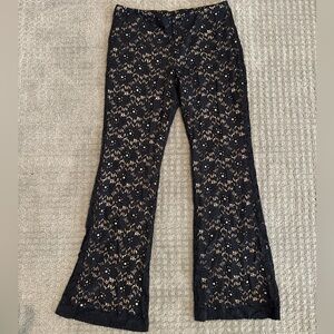 TD4 
Black lace fully-lined flare pants sz L